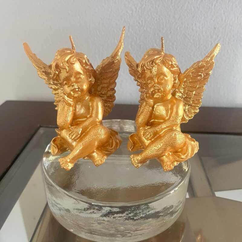 Ángel pensativo vela o candela